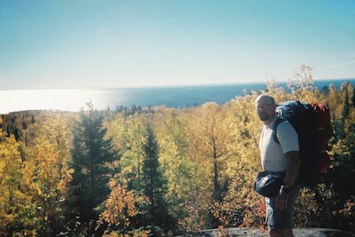 Alan Wenker with one of his backpacks
