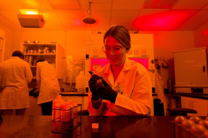 student researching in luminescense lab